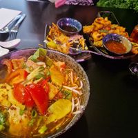 Spicy noodle soup and fried vegetables at An Lac in Flensburg