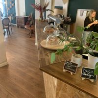 The bar (with cakes and coffee)  at Damals Hinterm Mond in Marburg