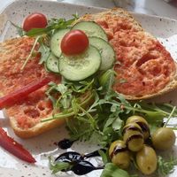 White ciabatta, tomato pesto & tomatoes with salad & olives  at Café Mozart in Mallorca