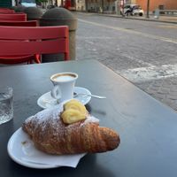 Brioche alla crema vegana e caffè macchiato di avena  at Sartoria Gastronomica in Bologna