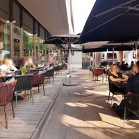 Outdoor seating at Deli in Flims