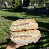 Plain bagel with scallion tofu cream cheese and vegan sausage   at Greenberg's Bagels in New York City