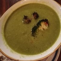 Roasted broccoli soup with homemade bread on the side at Bisschen Beißen in Vienna