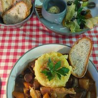 Coq au vin and the cheese plate at La Petite Véganerie - Brasserie in Berlin