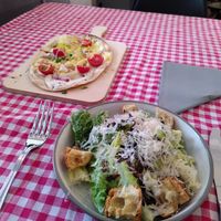 Ceasar salad and Flammkuchen at La Petite Véganerie - Brasserie in Berlin