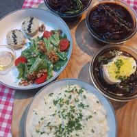 Cheese plate, onion soup, beef bourguignon, coq au vin at La Petite Véganerie - Brasserie in Berlin