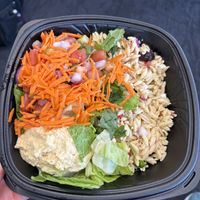 Crate your own bowl, but quinoa ended up having feta!!! Mis labeled on menu!!  at MSP - Greek Kitchen - T1 in St Paul