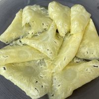 Pineapple carpaccio with cointreau   at Can Martí Restaurant in Tarragona