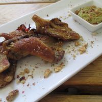 Seared Bath oyster mushrooms with pink peppercorns, topped with ground walnuts and served with sauce courchamps at The Green Rocket Cafe in Bath