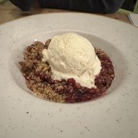 Berry and lavender crumble! ✨  at The Green Rocket Cafe in Bath