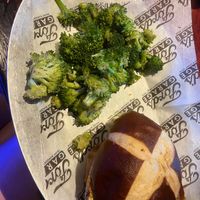 Veggie burger (Green & Clean) with side of broccoli  at Ford's Garage Gainesville in Gainesville