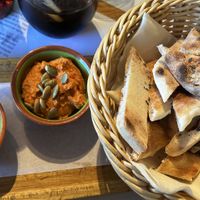 two kinds of hummus with bread  at El Racó in Palamos