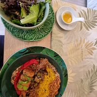 Hummus-falafel dish with fresh salad at Alma Veg  in Carcavelos