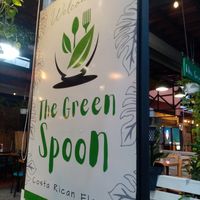 Outdoor seating area at The Green Spoon in La Fortuna