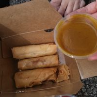 Spring roles with curry sauce at Ho Lee Fook  in Glasgow