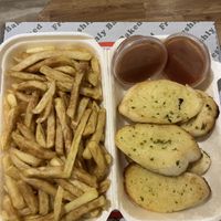 Chips and garlic bread  at Big Singhs in Wednesbury