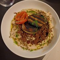 Hummus with spiced meat-free mince with grilled onion and tomato and red zaatar at Malka in Tauranga