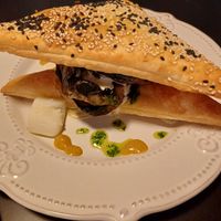 Sabich burekas. Aubergine steak, potatoes, amba and tahini sauce, in flaky borekas pastry at Malka in Tauranga