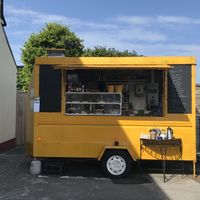 In the summertime they are using the food truck with a lovely patio next to it. In the winter (or when it rains) they will serve you inside the café.  at Teach An Tae Aran Cafe & Tea Rooms in Galway