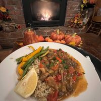 Vegan mushroom etouffee with oyster mushrooms served with coriander brown rice, garlicky green beans, and orange sweet peppers  at June Bug Cafe in Midpines