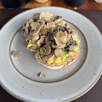 Avocado toast with mushrooms   at Papaya Cafe in Santa Maria