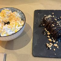 Mango coconut cake and Snickers🌱  at Baomerang in Porto