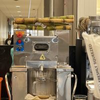 Sugar cane being juiced  at Freshly Squeezed  in Dieppe