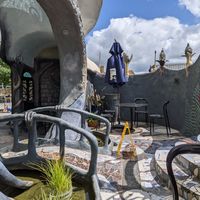 I sat in the sun near the entrance gate and little moat at Eutopia Cafe in Kaiwaka