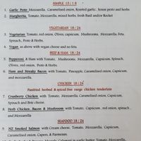 Pizza menu ~ Vegan cheese is an option at Eutopia Cafe in Kaiwaka