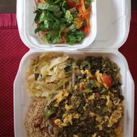 Vegan Ackee and Calaloo Meal with tossed salad, cabbage and rice & peas. at Mark's Caribbean Cuisine in Orlando
