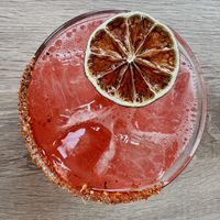 Berries margarita. Very tasty but kinda pricey  at Guac N Tacos in Elmhurst