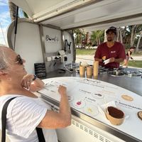 My wife ordering her ice cream   at Bount'iti in Tahiti