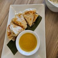Roti Canai- Indonesian flatbread w/curry sauce at Padmanadi Vegan Eatery in Calgary