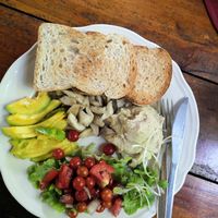 Toast with hummus & avocado & mushrooms at Om Garden Cafe in Pai