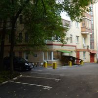 To the left will be a staircase leading down.  Not the staircase right in the middle, there! at Happy Vegan Shop - Sivtsev Vrazhek in Moscow
