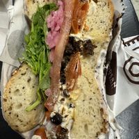 Vegan lox with arugula, tomato, onion, and capers  at Modern Bread & Bagel - Chelsea in New York City