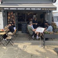 Outdoor seating  at Cafe M2B in North London