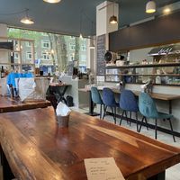 Small place with free tapwater by the counter. The toilet is at the right side of this area. at Kitchen Impossible Amsterdam in Amsterdam