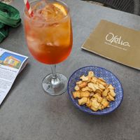 Aperol Spritz with non-vegan crackers at Ofélia in Tavira