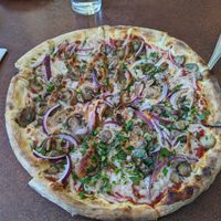 Pizza with mushrooms, red onions, and Daiya cheese at Amici's East Coast Pizzeria in Mountain View