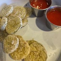 Half eaten pickle chips- substituted the jalapeño jam for the aioli.   at Black+Haus Tavern in Parker