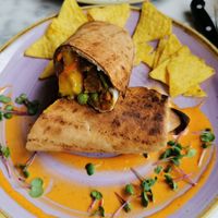 Burrito with Stickey Tempeh and Mango at The Happiness Café in Den Bosch