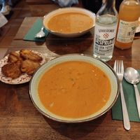 Cabbage soup with curry and coconut milk, side of baked potatoes  at little green kitchen - Kunibertsviertel in Cologne