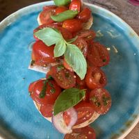 Mini bruschette su pane simil baguette  at Terra Promessa in Bruges
