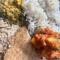 Curry, daal, rice and roti  at Mowgli  in Beverley