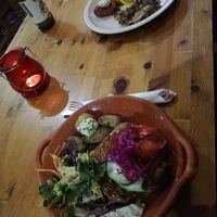 Bean burger with salad and lentil, potato plate at Princesa do Castelo in Lisbon