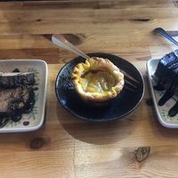 From top : cookie crumble with chocolate( kalter Hund), vegan pastel de nata, raw chocolate and basil cheesecake at Princesa do Castelo in Lisbon