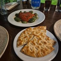 Pita bread and the peppers in tomato sauce at Konstantin Restaurant Cafe in Rhodes