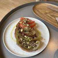 Toast special - tomato & pistachioo  at Selva Coffee in Sevilla