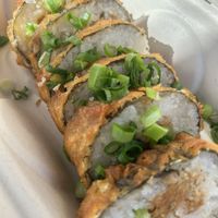 Chronic Roll - tempura fried & filled with lions mane mushroom “crab”, spicy tüna & avocado.  Best I’ve ever had!  at The Plot Express in Carlsbad